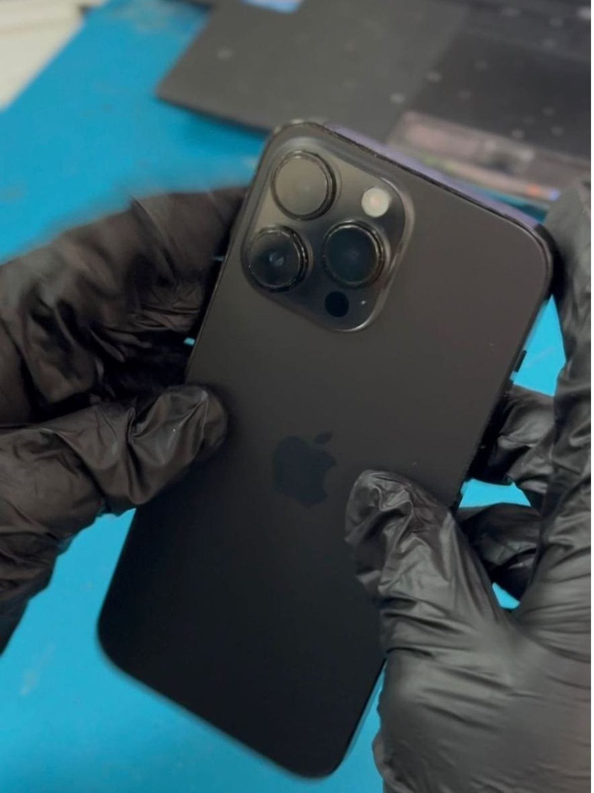 The same iPhone 14 Pro Max after back glass replacement at Techman Dubai, clean rear panel with camera module and lens covers intact